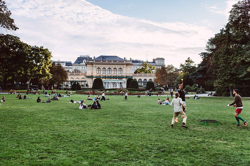 Stadtpark Vienna People playing on the grass in the Vienna Stadtpark.